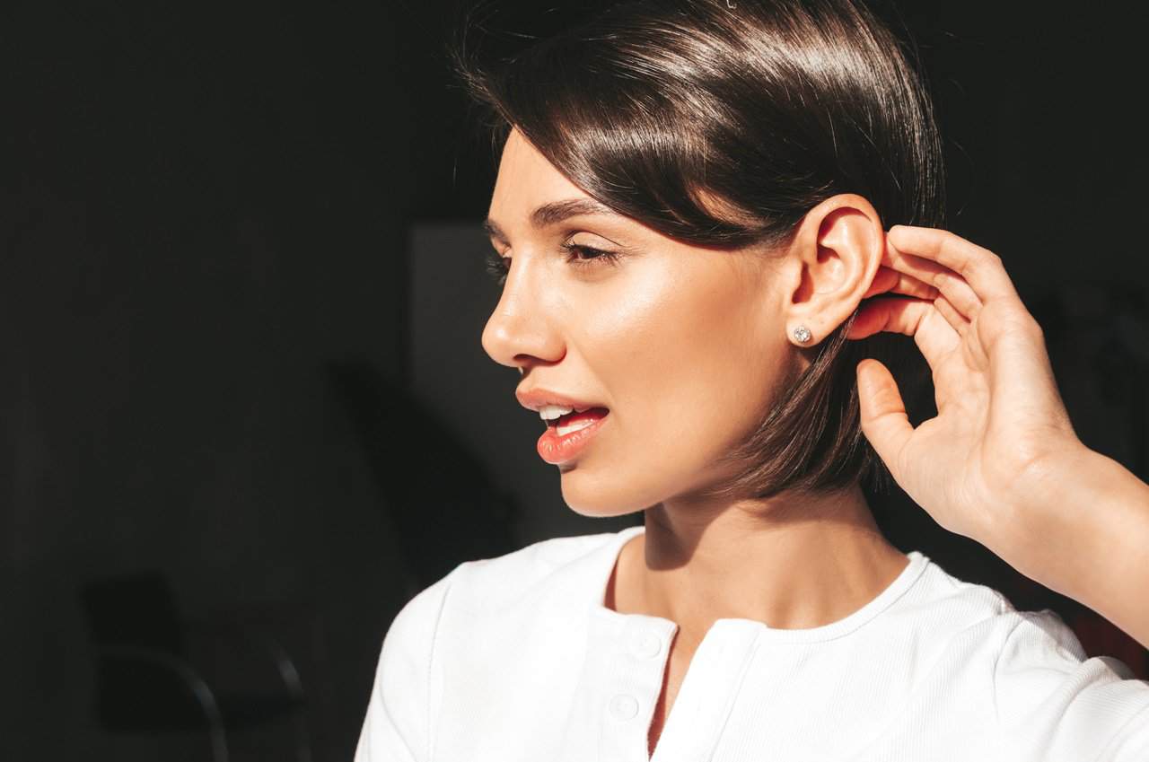 black haired woman with big size ears